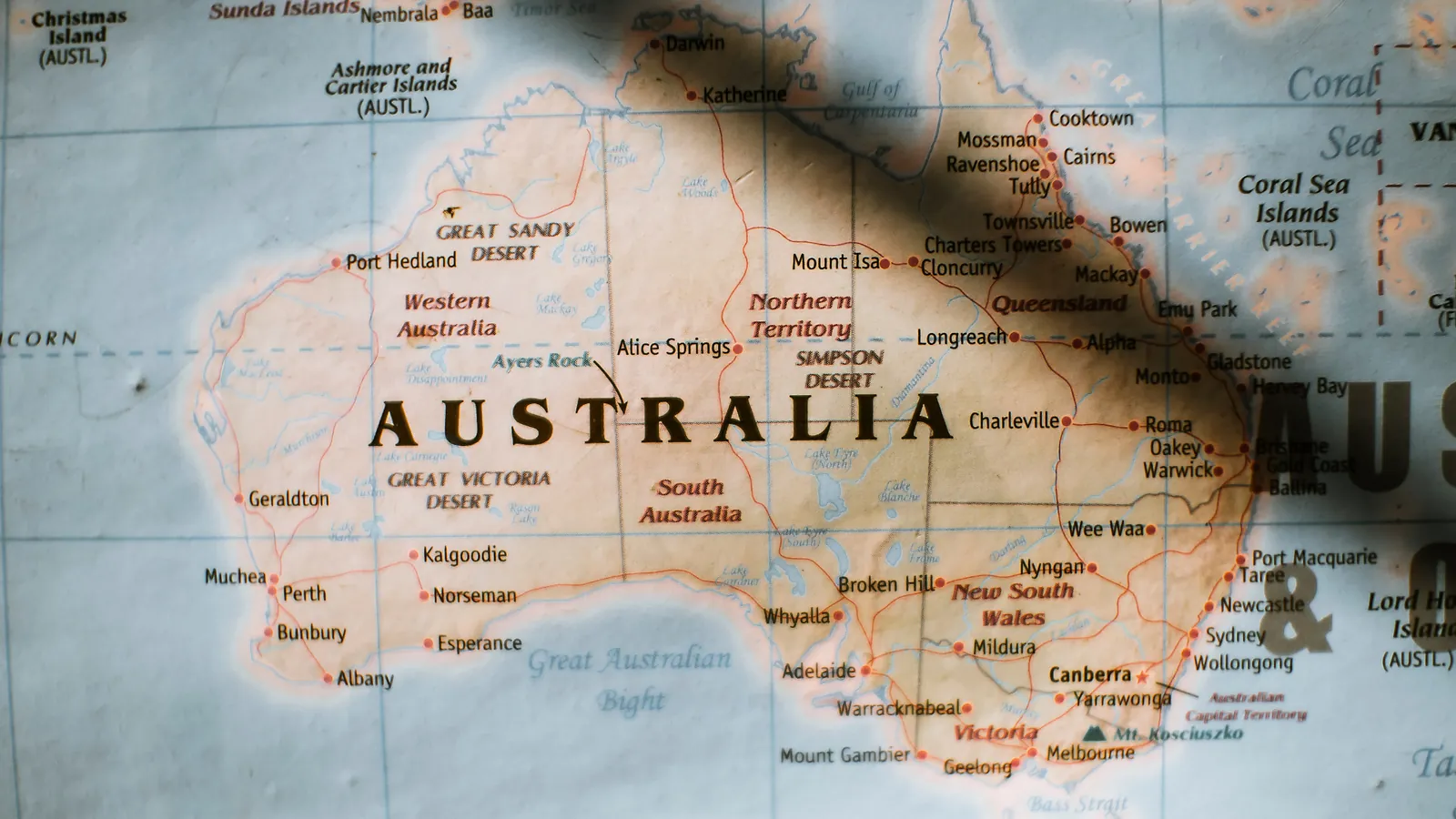 A printed map of Australia showing capital cities and states.
